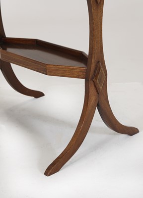 Lot 80 - A near pair of Directoire-style mahogany vide poches