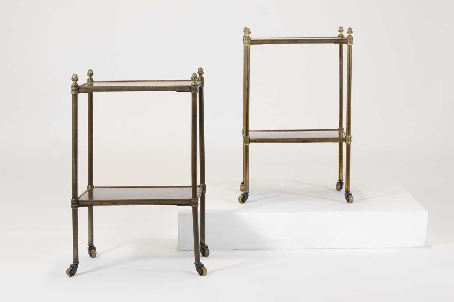 Lot 60 - A pair of Regency-style mahogany and brass étagères