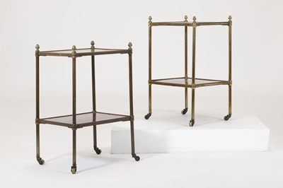 Lot 60 - A pair of Regency-style mahogany and brass étagères