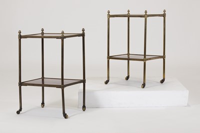 Lot 60 - A pair of Regency-style mahogany and brass étagères
