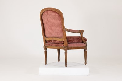 Lot 68 - A Louis XVI Transitional beech fauteuil à la reine