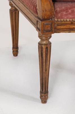 Lot 68 - A Louis XVI Transitional beech fauteuil à la reine