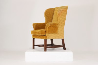 Lot 85 - A George III-style mahogany wingback armchair