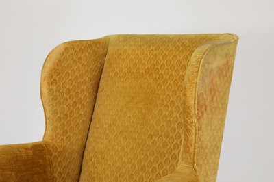 Lot 85 - A George III-style mahogany wingback armchair