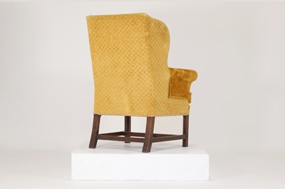 Lot 85 - A George III-style mahogany wingback armchair