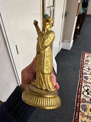 Lot 11 - A pair of ormolu chinoiserie candlestands