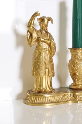 Lot 11 - A pair of ormolu chinoiserie candlestands