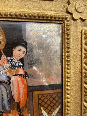 Lot 25 - An export reverse-painted glass mirror