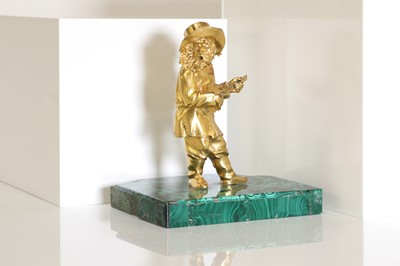 Lot 72 - A gilt-bronze figure of a musician