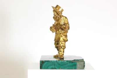 Lot 72 - A gilt-bronze figure of a musician