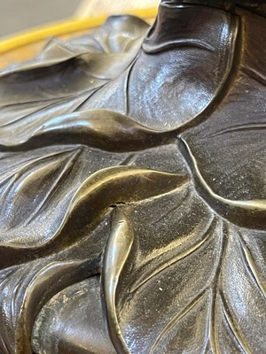 Lot 69 - A pair of patinated bronze table lamps