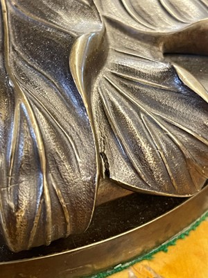 Lot 69 - A pair of patinated bronze table lamps