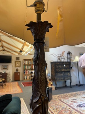 Lot 69 - A pair of patinated bronze table lamps