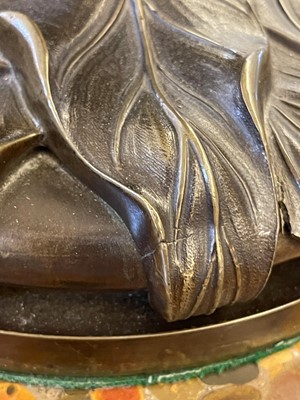 Lot 69 - A pair of patinated bronze table lamps