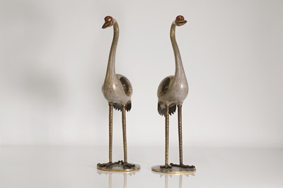 Lot 89 - A pair of cloisonné cranes