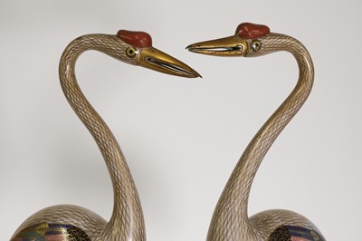 Lot 89 - A pair of cloisonné cranes