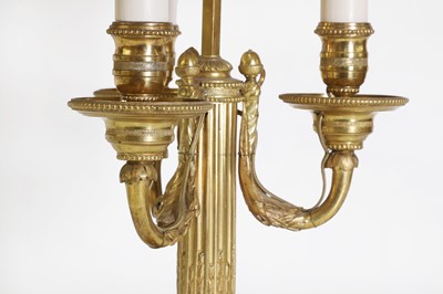 Lot 62 - A Directoire-style ormolu three-light bouillotte lamp