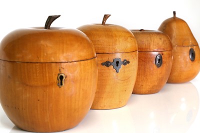 Lot 32 - Four George III fruitwood tea caddies