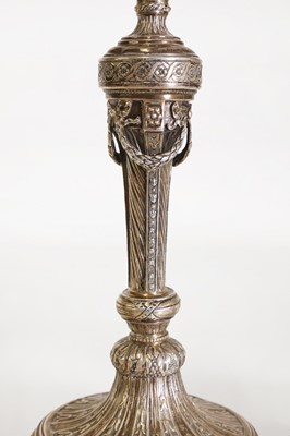 Lot 43 - A pair of German cast silver candlesticks