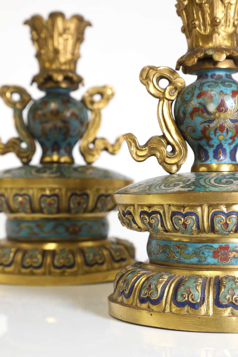 Lot 41 - A pair of gilt-metal-mounted cloisonné candlesticks