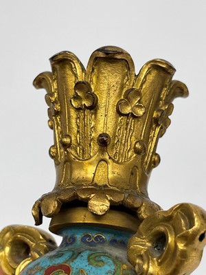 Lot 41 - A pair of gilt-metal-mounted cloisonné candlesticks