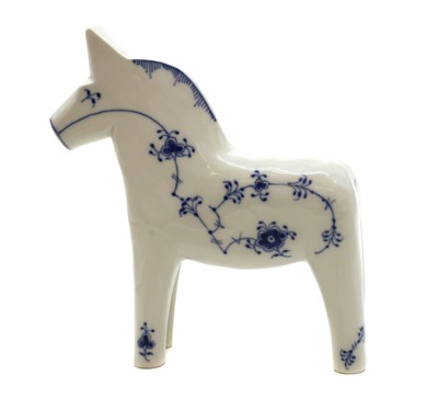 Lot 221 - A Royal Copenhagen porcelain 'Blue Fluted Plain' Dala horse