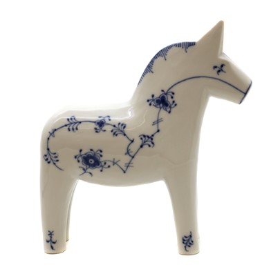 Lot 221 - A Royal Copenhagen porcelain 'Blue Fluted Plain' Dala horse