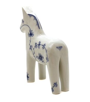 Lot 221 - A Royal Copenhagen porcelain 'Blue Fluted Plain' Dala horse