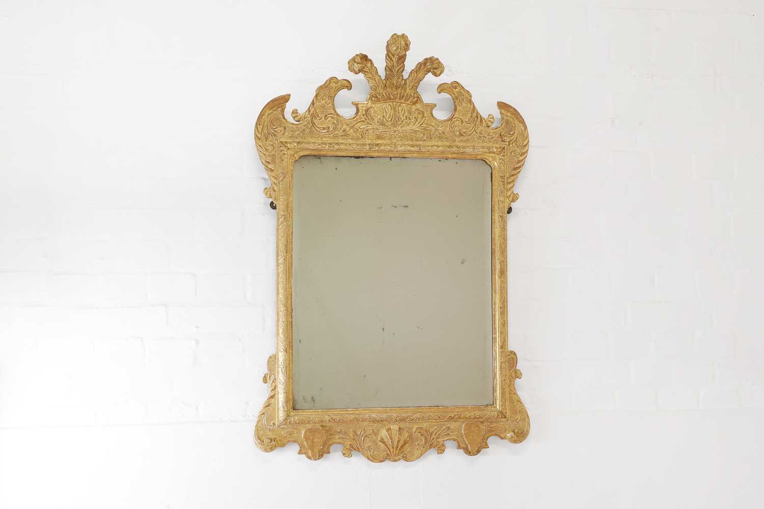 Lot 79 - A gilt-gesso pier glass