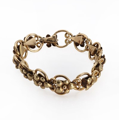 Lot 261 - A gold floral panel expanding bracelet