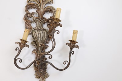 Lot 115 - A pair of carved and painted wood wall lights
