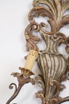Lot 115 - A pair of carved and painted wood wall lights