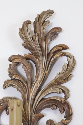 Lot 115 - A pair of carved and painted wood wall lights