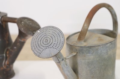 Lot 363 - A quantity of metal watering cans