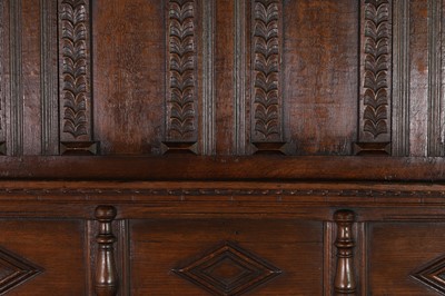 Lot 351 - A carved oak three-quarter tester bed
