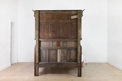 Lot 351 - A carved oak three-quarter tester bed