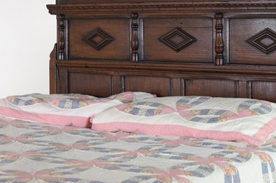 Lot 351 - A carved oak three-quarter tester bed