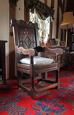 Lot 355 - An oak wainscot chair