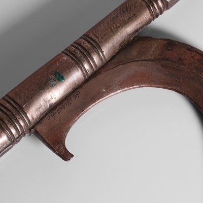 Lot 211 - An elephant driver's silvered-copper goad or ankus