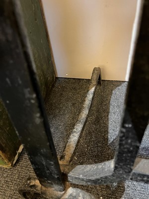 Lot 22 - A cast iron and brass fireguard
