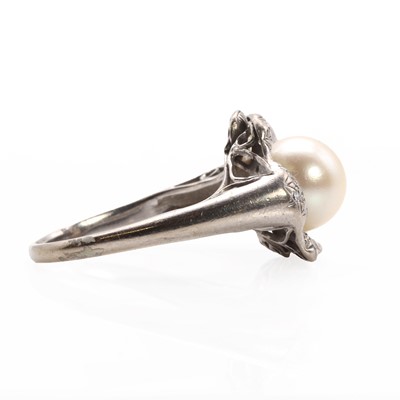 Lot 1040 - A white gold cultured pearl and diamond ring