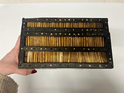 Lot 299 - A Sinhalese porcupine quill, ebony and ivory workbox