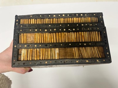 Lot 299 - A Sinhalese porcupine quill, ebony and ivory workbox
