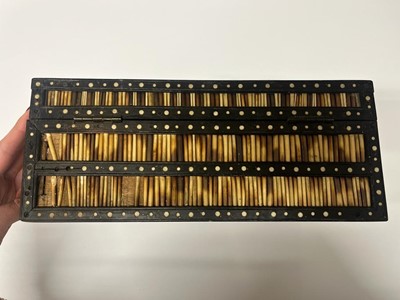 Lot 299 - A Sinhalese porcupine quill, ebony and ivory workbox
