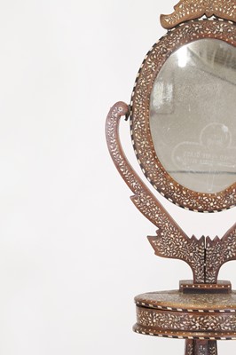 Lot 304 - A bone and ivory inlaid teak dressing mirror
