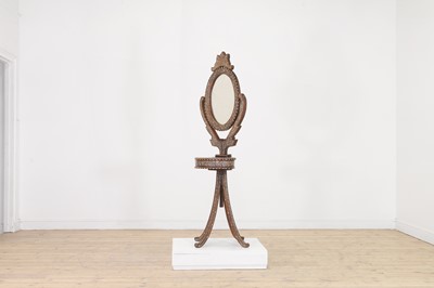 Lot 304 - A bone and ivory inlaid teak dressing mirror