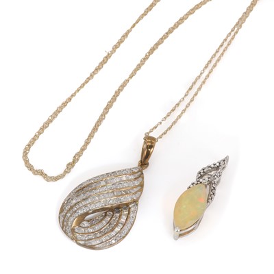 Lot 154 - A drop shaped diamond pendant and chain