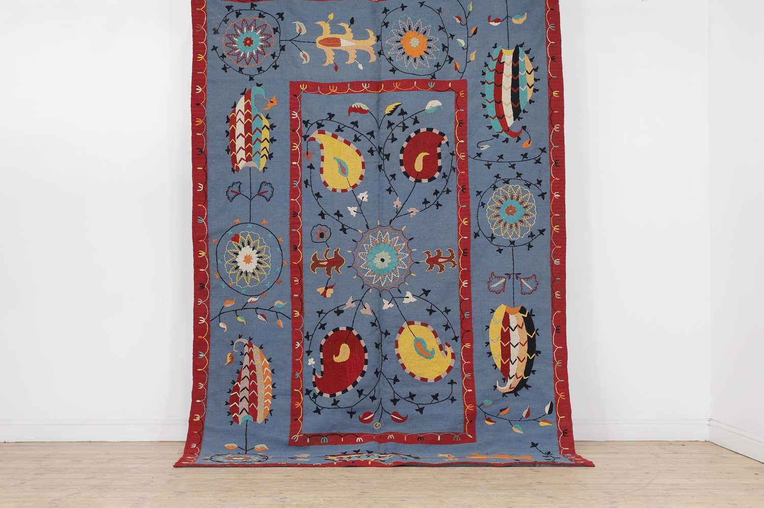 Lot 49 - A suzani-inspired flat-weave rug