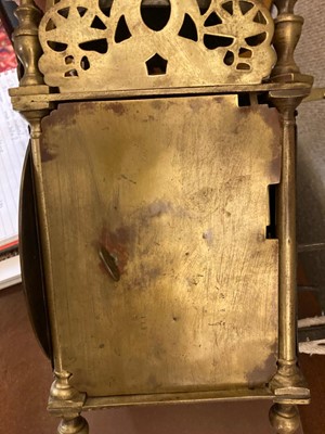 Lot 354 - A brass lantern clock