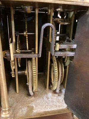 Lot 354 - A brass lantern clock